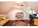 Well-lit home office with hardwood floors, a sloped ceiling, shelving, and a comfortable layout at 841 16Th Avenue Nw Ln, Hickory, NC 28601