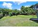 A well-maintained backyard with lush greenery and ample space for outdoor activities at 9800 Ashley Farm Dr, Matthews, NC 28105