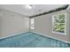 Cozy bedroom with natural light and ample space for comfort and relaxation at 9800 Ashley Farm Dr, Matthews, NC 28105