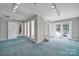 Large bonus room with plush carpet, and natural light at 9800 Ashley Farm Dr, Matthews, NC 28105