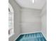 Walk-in closet with shelving and a window for natural light at 9800 Ashley Farm Dr, Matthews, NC 28105