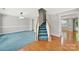 Inviting living room with hardwood floors and plush carpet at 9800 Ashley Farm Dr, Matthews, NC 28105