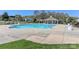 A sparkling community pool surrounded by lounge chairs, a pergola and well-manicured lawns at 103 Pamlico Ln, Mooresville, NC 28117