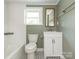 Cozy bathroom with subway tile surround and black and white mosaic tile floor at 110 College St, Marshville, NC 28103