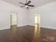 Living room features beautiful hardwood floors and ample natural light at 110 College St, Marshville, NC 28103