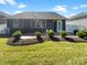 Backyard featuring a patio, garden, and lush grass at 1332 Kings Grove Dr # Lot 18, York, SC 29745