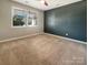 Bedroom with natural light and neutral carpeting at 1332 Kings Grove Dr # Lot 18, York, SC 29745
