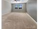 The spacious bedroom has plush carpeting and a ceiling fan, offering comfort and style at 1332 Kings Grove Dr # Lot 18, York, SC 29745