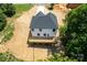 This aerial perspective showcases the deck and surrounding lot at 135 Brookview Dr, Shelby, NC 28152
