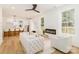 Open-concept living room showcasing a modern fireplace and seamless flow into the kitchen at 135 Brookview Dr, Shelby, NC 28152