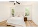 Cozy bedroom featuring natural light, hardwood floors, and minimalist decor at 135 Brookview Dr, Shelby, NC 28152