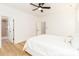 Bright main bedroom with an ensuite bathroom, hardwood floors and modern ceiling fan at 135 Brookview Dr, Shelby, NC 28152
