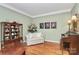 Elegant living room with hardwood floors, comfortable seating, and tasteful decor at 13824 Glen Abbey Dr, Charlotte, NC 28278