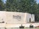 Stone wall water feature at the entrance of a community at 13824 Glen Abbey Dr, Charlotte, NC 28278