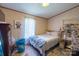 Bedroom with a bed and a blue laundry basket on the floor at 1495 Leonards Fork Church Rd, Lincolnton, NC 28092
