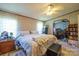 Cozy bedroom featuring a comfortable bed and a ceiling fan for added relaxation at 1495 Leonards Fork Church Rd, Lincolnton, NC 28092