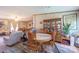 Cozy dining area featuring a wooden table set and a classic china cabinet, with view to living room at 1495 Leonards Fork Church Rd, Lincolnton, NC 28092