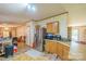 Functional kitchen with wooden cabinets, stainless steel refrigerator, and open layout at 1495 Leonards Fork Church Rd, Lincolnton, NC 28092
