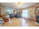 Spacious living room featuring a fireplace, wood-look floors, and plenty of room for seating at 1495 Leonards Fork Church Rd, Lincolnton, NC 28092