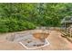 Green backyard with upper wood deck and in-ground pool at 1713 Poe Cir, Hickory, NC 28601