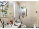 Neat bathroom with tiled walls, offering essential amenities for a comfortable and functional space at 1713 Poe Cir, Hickory, NC 28601