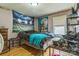 Bedroom with hardwood floors and unique decor at 1713 Poe Cir, Hickory, NC 28601