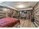 Bedroom featuring rustic wood paneling and decor, offering a cozy and personalized space at 1713 Poe Cir, Hickory, NC 28601