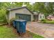 Charming home exterior with a two-car garage and ample driveway parking at 1713 Poe Cir, Hickory, NC 28601