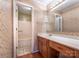 Bathroom area with vanity, mirror, and access to the tub and shower at 1735 Robinwood Rd, Gastonia, NC 28054