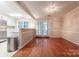 Bright dining area with access to the kitchen and outdoor patio at 1735 Robinwood Rd, Gastonia, NC 28054