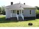 Charming single-story home with grey siding and white trim at 201 Park Ave, Mount Holly, NC 28120