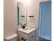 Modern bathroom vanity with a white speckled top and matte black faucet and hardware at 2051 Highwood Rd, Rock Hill, SC 29732