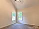 Bedroom with neutral walls, carpeted floor and large windows offering natural light at 2051 Highwood Rd, Rock Hill, SC 29732