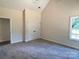 Bright bedroom featuring neutral walls, plush carpet, and a window view at 2051 Highwood Rd, Rock Hill, SC 29732