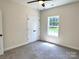Bright bedroom with a ceiling fan, closet and a window providing a view at 2051 Highwood Rd, Rock Hill, SC 29732