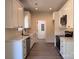 Well-lit kitchen featuring white cabinets and stainless steel appliances at 2051 Highwood Rd, Rock Hill, SC 29732