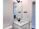Bright vanity with modern black fixtures, a white countertop, and a large mirror at 2063 Highwood Rd, Rock Hill, SC 29732