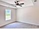 Inviting bedroom with a ceiling fan and a large window offering natural light at 2063 Highwood Rd, Rock Hill, SC 29732