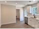 Stylish kitchen featuring stainless steel appliances, white cabinets, and bright eating area at 2063 Highwood Rd, Rock Hill, SC 29732