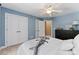 A bedroom with a ceiling fan, closet, and an open door at 2074 Brandt Rd, York, SC 29745