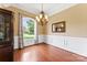Bright dining room with wainscoting, large window and chandelier lighting at 2074 Brandt Rd, York, SC 29745