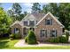 Charming brick home with dark shutters, manicured landscaping, and a welcoming front entrance at 2074 Brandt Rd, York, SC 29745