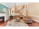 Bright and cozy living room featuring hardwood floors and staircase to a loft at 2074 Brandt Rd, York, SC 29745