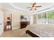 Spacious bedroom with a large window, ceiling fan, and ensuite bathroom at 2074 Brandt Rd, York, SC 29745