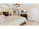 Bedroom features a tray ceiling, ceiling fan, carpet and neutral paint at 2074 Brandt Rd, York, SC 29745