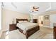 Bedroom features a tray ceiling, ceiling fan, carpet and neutral paint at 2074 Brandt Rd, York, SC 29745