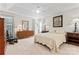 Tranquil bedroom with soft carpet, dresser, and rocking chair at 210 Oak Village Pkwy, Mooresville, NC 28117