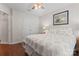 Comfortable bedroom with a neutral color scheme, ceiling fan, and ample natural light at 210 Oak Village Pkwy, Mooresville, NC 28117