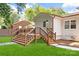 Back exterior featuring a deck and stairs, with access to the yard and house at 2120 Shadyview Dr, Charlotte, NC 28210