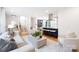 Open concept living space featuring modern furnishings, hardwood floors, and natural light at 2120 Shadyview Dr, Charlotte, NC 28210